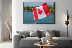 Plakat: Canadian flag blowing in the wind thousand islands canada ontario