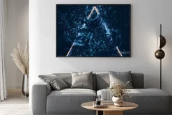 Plakat: Creative fluorescent color layout made of blue tropical leaves