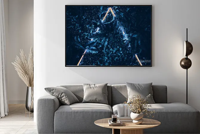 Plakat: Creative fluorescent color layout made of blue tropical leaves