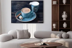 Plakat: Filiżanka kawy z mlekiem, cynamonem i cukrem