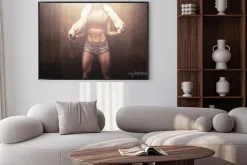 Plakat: Fitness woman after hard workout training holding white sports