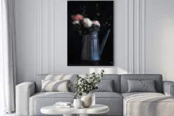 Plakat: Flowers in a watering can, looking like an old still life painting,