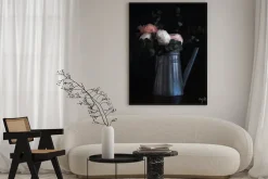 Plakat: Flowers in a watering can, looking like an old still life painting,