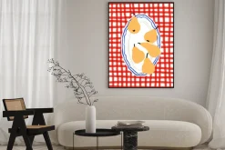 Plakat: Gruszki na czerwonym tle w kratę