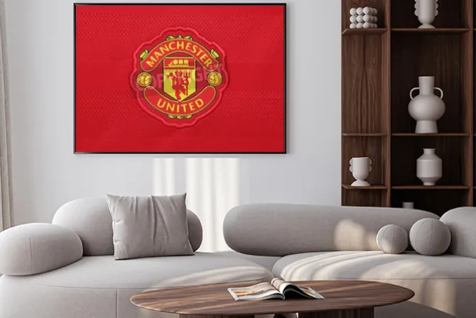 Plakat: Herb klubu manchester united na czerwonym tle