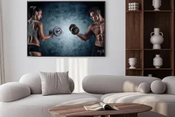 Plakat: Mężczyzna i kobieta z hantlami