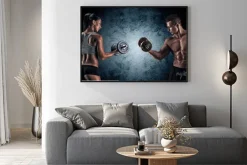 Plakat: Mężczyzna i kobieta z hantlami