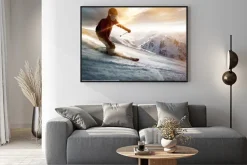 Plakat: Narciarz w otoczeniu słońca