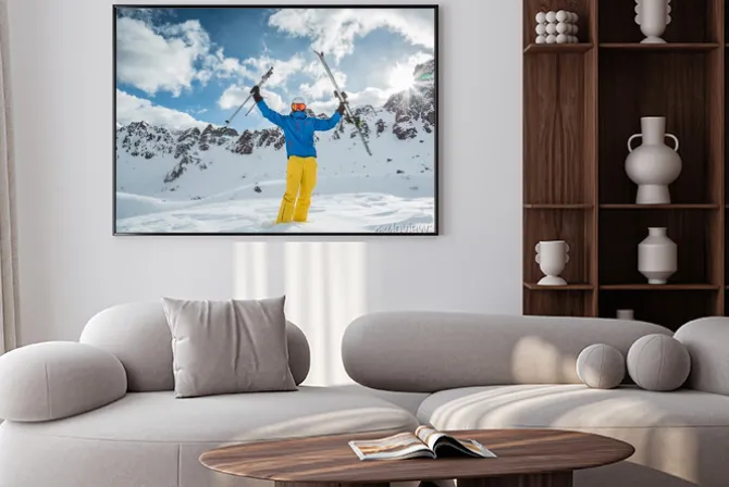 Plakat: Narciarz w wysokich górach