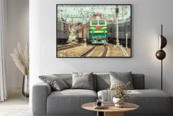 Plakat: Passenger trains move on the station at day time.