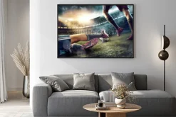 Plakat: Piłkarze grający na stadionie