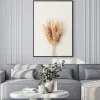Plakat: Reeds foliage branches bouquet on neutral pastel beige background.