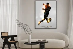 Plakat: Sylwetka piłkarza z efektem świetlnym