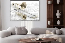 Plakat: Trombón r trompeta sobre partituras 2