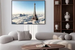 Plakat: Wieża eiffla nad chmurami