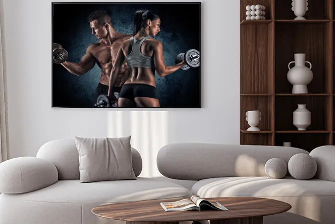 Plakat: Wysportowana para na siłowni